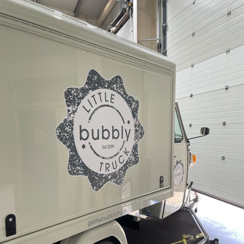 Van/truck with logo branding graphics on the side